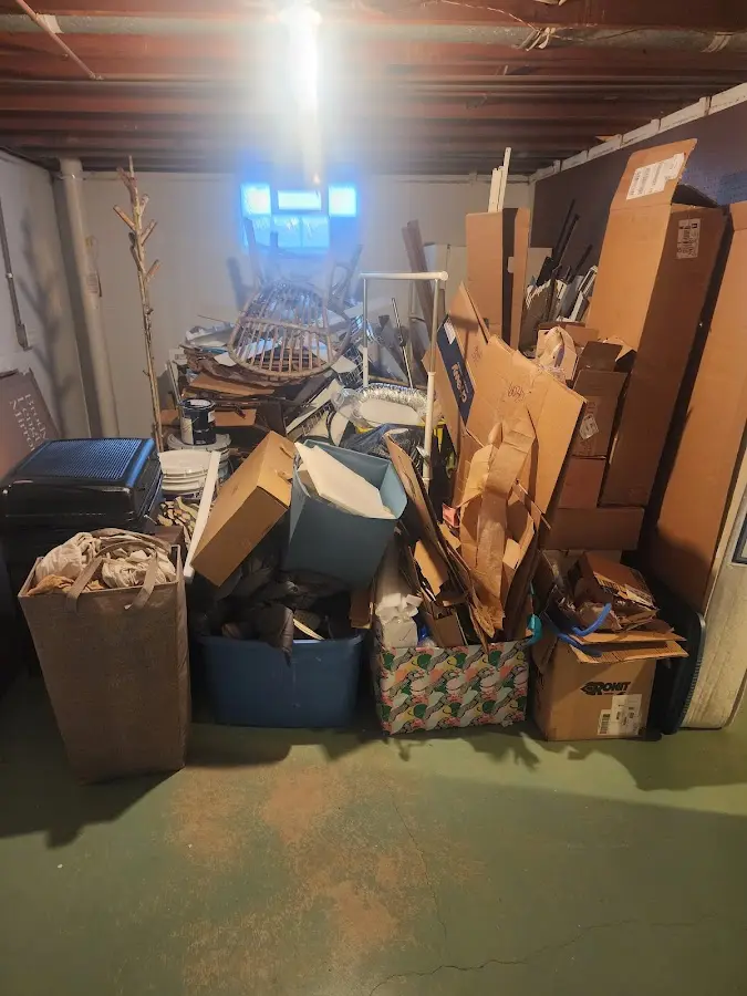 Roll-off dumpster container at job site for 2 Yard Dumpster Rental in Mohawk